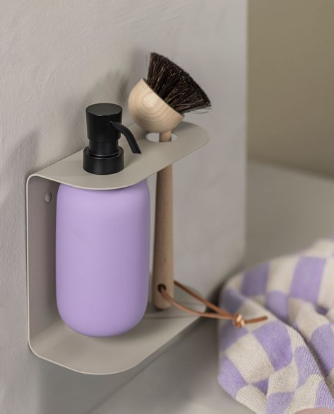 Practical, elegant, and effortlessly stylish – our CARRY holders bring both form and function to your bathroom or kitchen. Finished in a smooth sand grey, these minimalistic holders add a refined touch to your space while their durable powder-coated finish ensures they withstand daily use and resist humidity.⁠ ⁠ The SINGLE holder is perfect for wall-mounting a hand or dish soap dispenser, while the DOUBLE holder offers space for two dispensers or even a dishwashing brush when used in the kitc... Wall Soap Dispenser Bathroom, Wall Soap Dispenser, Soap Wall Holder, Wall Hung Soap Dispenser, Wall Mounted Soap Bottle Holder, Dish Soap Dispenser, Soap Dispenser, Dish Soap, Wall Mount