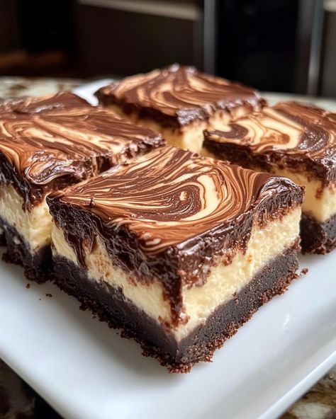 Nutella Swirled Cheesecake Bars Nutella Swirl Cheesecake, Nutella Swirls, Nutella Bars, Nutella Cheesecake Bars, Swirled Cheesecake, Nutella Cheesecake Recipes, Nutella Bar, No Bake Nutella Cheesecake, Greek Yogurt Flavors