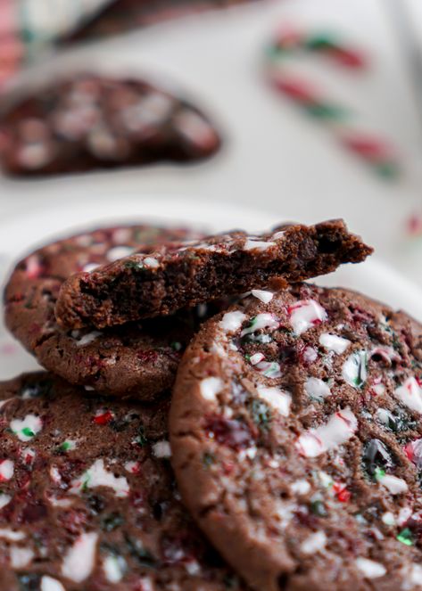 These chocolate candy cane cookies are soft, chewy and super festive for the holidays. They are perfectly minty and chocolatey with candy cane bits scattered throughout. Not to mention, they are easy and fun to whip up for a cookie exchange. Enjoy with a tall glass of cold milk. Peppermint Chocolate Cookies, Chocolate Candy Cane Cookies, Candy Cane Dessert, Christmas Baking Cookies, Chocolate Peppermint Cookies, Peppermint Chocolate, Candy Cane Cookies, Kinds Of Cookies, Roll Cookies