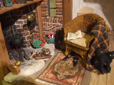 doll house miniature witch cottage   A picture of my favorite corner again.  I have now added the little cookbook on the chair.  Eucalypta is a bit like me.  Has no imagination whatsoever when it comes to cooking. ;-) Witch's Cottage, Village Miniature, Witches Cottage, Miniature Witch, Witches House, Witch Room, Cottage Prints, Cottage Witch, Witch Cottage