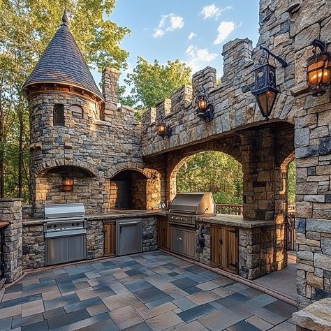 This castle-inspired outdoor kitchen merges medieval charm with modern functionality, creating a majestic space for outdoor cooking and entertaining. Featuring stone-clad walls, arched doorways, and wrought-iron accents, the design evokes the grandeur of an ancient fortress. A central stone hearth serves as the focal point, perfect for open-fire cooking, while Gothic-style lighting and a turreted pizza oven add to the old-world ambiance. Ideal for hosting grand feasts, this kitchen offers a u... Ancient Fortress, Castle Kitchen, Tiny Castle, Castle Kitchens, Stone Hearth, Arched Doorways, Open Fire Cooking, Arch Doorway, Diy Home Bar