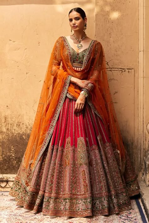 Red raw silk lehenga featuring floral kasab, dori, dabka, and nakshi embroidery. Paired with a padded blouse with crystal drops and a contrast semi-sheer dupatta., Fit: Relaxed Mehendi Dresses, Orange Lehenga, Latest Bridal Lehenga Designs, Maharani Designer Boutique, Bridal Lehenga Designs, Simple Lehenga, Latest Bridal Lehenga, Wedding Lehenga Designs, Lehenga Designs Simple