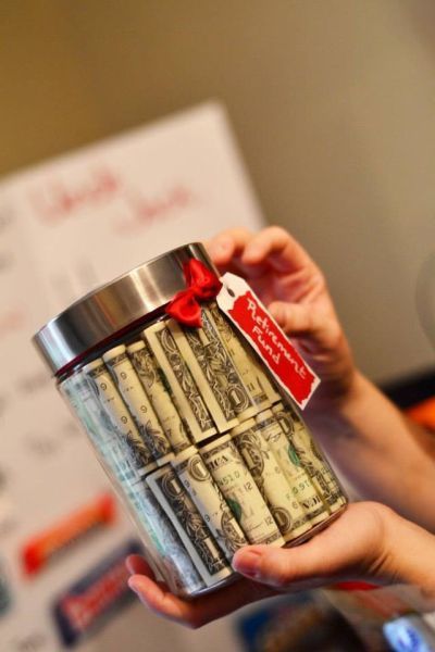 Fifty one dollars bills rolled up and stacked inside a clear jar.  See more 50th birthday gift ideas and party ideas at www.one-stop-party-ideas.com 50th Birthday Gift Ideas, 50th Birthday Presents, Moms 50th Birthday, Creative Money Gifts, Birthday Money, Cash Gift, College Gifts, 50th Birthday Gifts, 50th Birthday Party