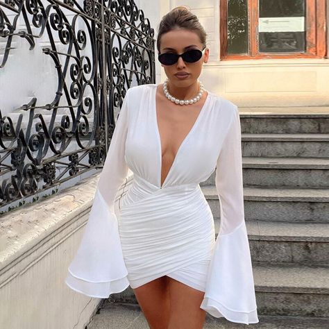 Need a dress that transitions perfectly from day to night? Shop online at fortfemeni.com #womensfashion #fortfemeni #whiteoutfit #transitionalfashion #summerdresses Club Fashion, Mini Homecoming Dresses, How To Fold Sleeves, Mini Dresses For Women, Hip Dress, Layered Skirt, Celebrity Dresses, Flared Sleeves, Wrap Skirt