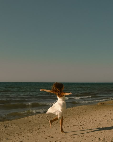 Wind, sunshine and waves ,, the simple things with the ability to make one's hair and soul feel like twirling and dancing ☆mandie jo    Mirror photography, beach,waves,card games, movie, cinematic, dreamy, senior ideas, sand, photoshoot ideas, inspo, summer, spring, autumn, outfit inspo, white dress, mirror ideas, auburn hair, dancing, leaping Flowy Beach Photoshoot, Dance Beach Photoshoot, Dance Beach Photography, Twirling In Dress, Dreamy Beach Photoshoot, Dress In The Wind, Dancing On Beach, Beach Dance Photography, Sand Photoshoot