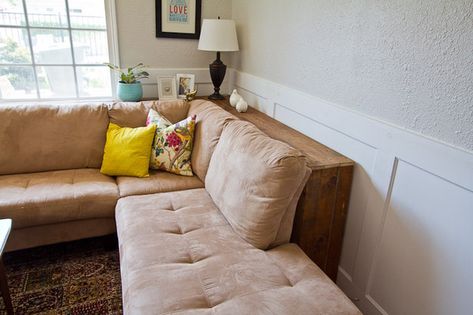 Pull furniture away from the wall to create the illusion of spaciousness. | 19 Foolproof Ways To Make A Small Space Feel So Much Bigger Table Behind Couch, Diy Console Table, Behind Couch, Tiny Apartments, Couch Table, Diy Sofa, Tiny Living, A Living Room, Small Space Living