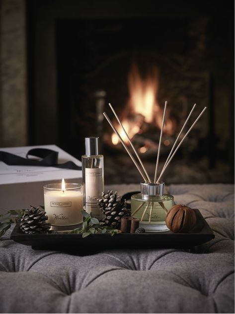 Fill you home with festive fragrances this Christmas. The inviting aroma of stepping in from the cold, Winter will instantaneously wrap your senses with its warm, spicy scent. Curl up on an armchair as notes of sweet cinnamon and clove add warmth to your room, while a dash of fresh orange rebalances your mood. This bestselling festive blend adds a perfectly welcoming touch to your living room and hallway in the lead-up to Christmas. White Company Christmas, Christmas Fragrance, Winter Fragrance, Candles Photography, Fresh Orange, Coffee Table Styling, Winter Home, White Company, Home Scents