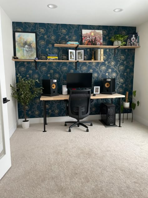 We decided to add an accent wall using bold patterned wallpaper and custom oak shelves for the office. Office Wall Paints, Office Wall Shelves, Office Creative Space, Office Wall Colors, Office And Library, Home Office Creative, Office Creative, House Redesign, Patterned Wallpaper