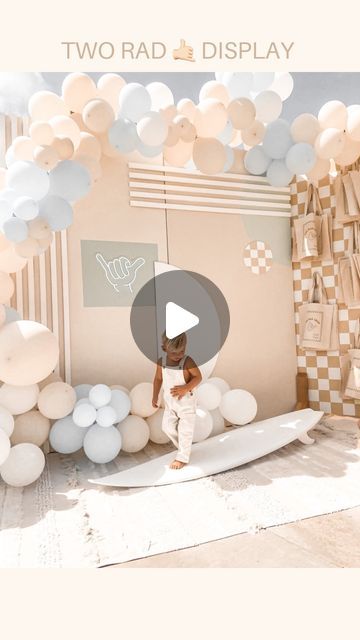 Bonnie Stone | Honest Mom Life on Instagram: "Two Rad 🤙🏻🌊 DIY Party Backdrop complete.   • I made the balloons + installed them (highlight on stories + page)  • painted the checkerboard backdrop  • painted the surfboard  • made over/painted the backdrop from @relevantraw   DIY tote bag wall coming tonight.   Head to my stories or highlights in my page for all the DIY party projects. If I missed something comment and ask below." Sailboard Balloon Backdrop, Totally Twobular Birthday Party, Totally Two-bular Birthday, The Big One Surf Birthday Balloon Arch, Surf Party Backdrop, Diy Party Backdrop, Diy Surfboard, Bag Wall, Diy Tote