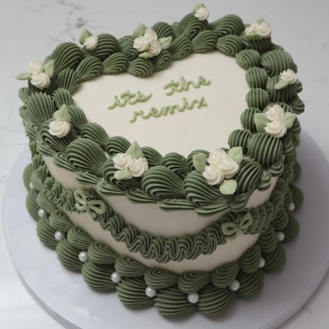 it’s the remix 💚 Inspo @aprilsbakerlondon 🫶 - Cake Details - Size: Standard 7” (two layers) Add-ons: Pearls (edible) #emmacakesseattle #seattle #cakes #heartcake #cakedecorating #wiltontips #customcakes Green Heart Shaped Cake, Birthday Cake Aesthetic Green, Sage Green Cake, Green Birthday Cakes, Heart Birthday Cake, 14th Birthday Cakes, White Birthday Cakes, Vintage Birthday Cakes, Baked Desserts