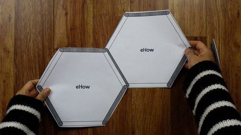 Hexagon Honeycomb Shelves Made With Popsicle Sticks Tutorial | eHow Popsicle Stick Hexagon, Honeycomb Shelf, Hexagon Shelf, Honeycomb Shelves, Shelf Decor Living Room, Diy Popsicle, Hexagon Shelves, Popsicle Stick Crafts, Popsicle Stick