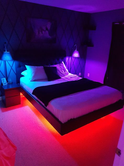 Led Lights Bedroom For Men, Romantic Led Lights Bedroom, Black Gamer Room Aesthetic, Rgb Bedroom Ideas, Led Lit Bedroom, Kids Room Led Lights, Levitating Bed With Led Lights, Luxury Bedroom Master Led Lights, Cool Room Ideas For Guys Led Lights