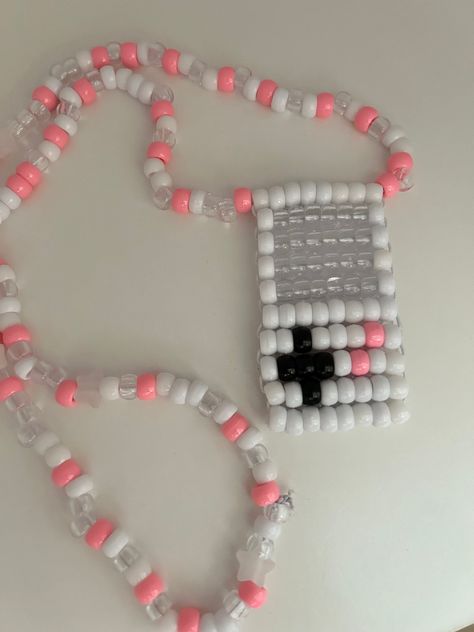 Handmade and Crafted Kandi Gameboy Necklace  Backing is glued on to keep beads in place and make sturdier  Roughly 15 inches long Kandi Gameboy, Bead Ideas Crafts Diy Projects, Kandi Choker Tutorial, Kandi Perler Beads, Kandi Cuff Ideas Easy, Kandi Collar, How To Make Kandi, Shark Kandi, Kandi Necklace Ideas