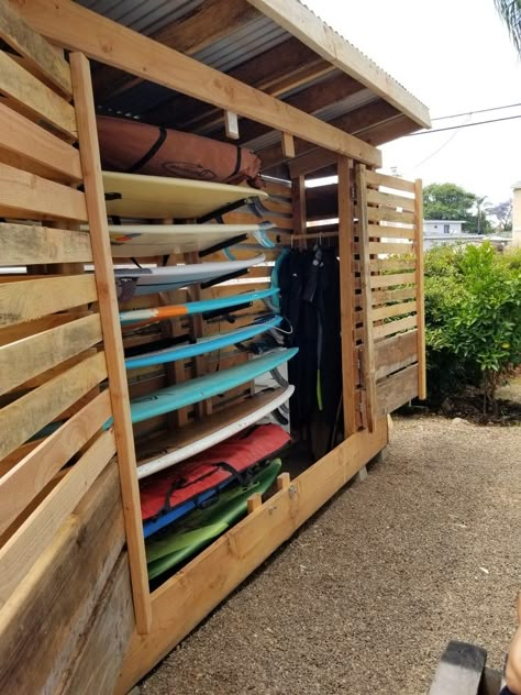 30"x12'x8' Corrugated steel roof and solid wood structure with swinging barn door style. Holds 10 surfboards up to 10' in length, several wetsuits. Skateboards, wax, combs, and leashes. #ParagonSurfboards #Stuckybumps #Surfshed #SanDiegoSurf #921OB #ChannelIslandSurfboards Surfboard Storage Outdoor, Surfboard Shed Storage, Surfboard Storage Garage Ceilings, Surf Board Storage Shed, Surfboard Storage Shed, Outdoor Surfboard Rack, Surf Storage Ideas, Surf Shed Ideas, Surf Board Rack Diy