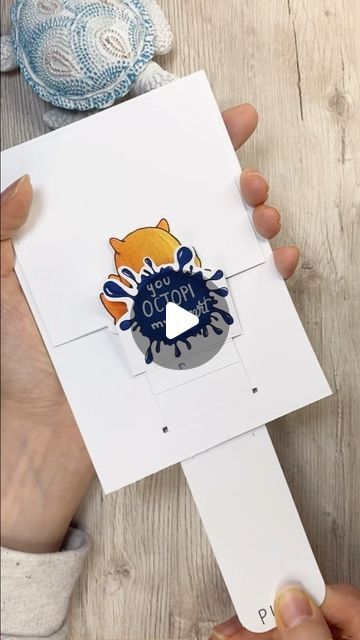 Katharina Tarta Crafts on Instagram: "On popular demand: Here the tutorial for the pull and flip mechanism. It’s really rather simple, but with an amazing card effect 😊  Oh and if you like this adorable little dumbo octopus as much as I do, then you‘re in luck, cause you can now get it as a digital stamp on my patreon 😊🦑  #papercrafts #interactiveart #cardmaking #handmade #diybirthdaycard #cardmakersofinstagram #cardmakingtutorial #funcrafts" Pull Up Card Diy, Pull Cards Tutorials, Pull Out Card Ideas, Paper Pull Out Card, Pull Out Cards Diy, Pull Cards Diy, Interactive Cards Tutorial, Diy Interactive Cards, Pull Up Card