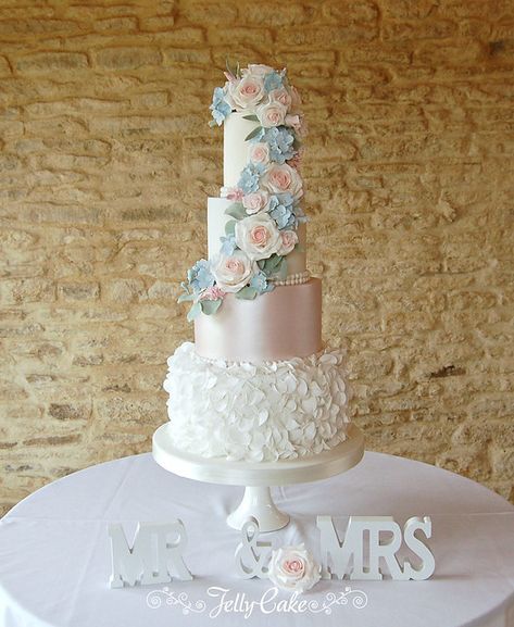 Wedding Cake Sugar Flowers, Ruffles Wedding Cake, 6 Tier Wedding Cakes, Light Blue Wedding Cake, Woodland Wedding Cake, 5 Tier Wedding Cakes, Kingscote Barn, Pastel Wedding Theme, Blue And Blush Wedding