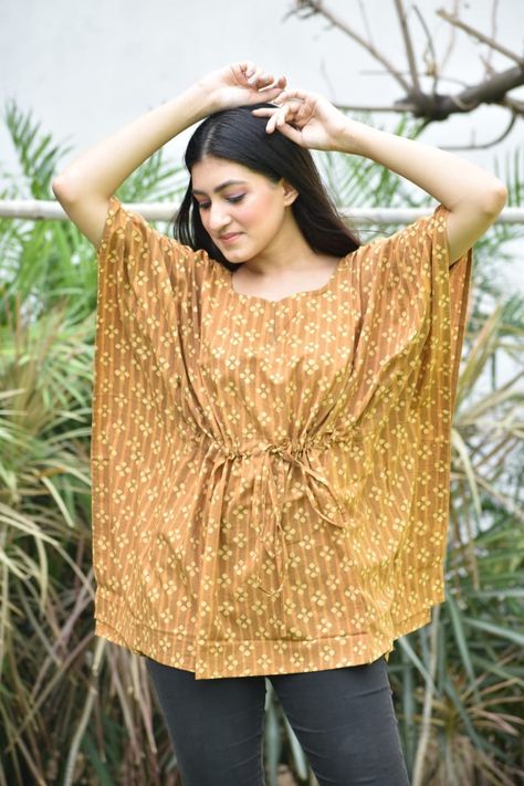 🔸️Hand Block printed *SHORT KAFTAN* 🔸️Authentic PRINT, with natural colours. 🔸️100% Pure cotton 🔸️Free Size. 🔶length 28 Inches 🔸️Limited collection.BOOK FAST. 🔸️PRICE-850₹ Types Of Tops For Women, Short Kaftan Tops, Different Types Of Tops, Kimono And Jeans, Types Of Tops, Kaftan Pattern, Cotton Tops Designs, Indian Tops, Kaftan Tops