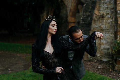 Adams Family Engagement Photos, Addams Family Inspired Photo Shoot, Gomez And Morticia Photo Shoot, Morticia And Gomez Wedding Theme, Halloween Wedding Party Attire, Morticia And Gomez Engagement Photos, Morticia And Gomez Addams Photoshoot, Gothic Wedding Poses, Goth Wedding Photo Ideas