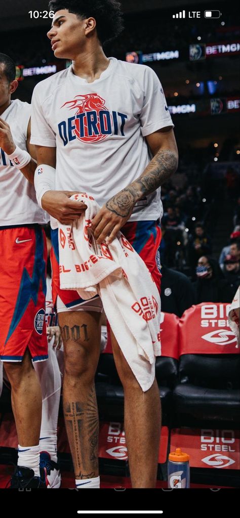 Cool Small Leg Tattoos For Men, Nba Leg Tattoos, Nba Tattoos Basketball Players, Word Leg Tattoos Men, Leg Tattoos For Guys Ideas, Devin Haney Leg Tattoo, Hooper Tattoo Ideas, Back Calf Tattoos Men, Simple Leg Tattoo Men