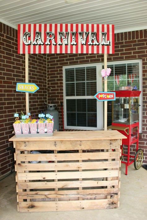 Carnival birthday party stand- popcorn and cotton candy, lemonade. Made from pallets. Pallet Carnival Booth, Carnival Popcorn Stand, Carnival Stands Diy Booth Ideas, Diy Carnival Fun House, Fall Fair Birthday Party, Carnival Birthday Party Decorations Diy, Carnival Bday Party Ideas, Diy Popcorn Stand, Fall Carnival Birthday Party