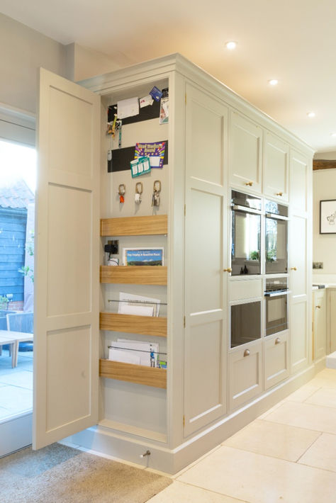 This hidden cupboard is perfect for storing the less aesthetic bits and bobs that you acquire but don't want to get rid of. We have disguised this in an end panel for easy access but keeping it concealed. Click for project details #BakerandBaker Decorative End Panels For Cabinets, Around Fridge Cabinets, Organized House Aesthetic, Kitchen Inside Cabinets Ideas, Kitchen End Cabinet Ideas, Kitchen End Panel Ideas, Small Hidden Pantry, Kitchen Cupboard Layout, Hidden Kitchen Ideas