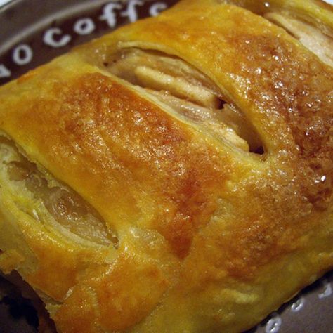 Real German Apple Strudel Recipe | Just A Pinch Recipes -  Pat's Story  This recipe was brought over from   Germany by my Great Aunt Martha Mueller. Hope you enjoy this recipe as much as my family does.  Great topped with ice cream, whipped cream or milk like my Uncle did. German Apple Strudel Recipe, German Apple Strudel, German Sweets, Apple Strudel Recipe, German Food Authentic, Strudel Recipes, German Desserts, German Baking, Apple Strudel