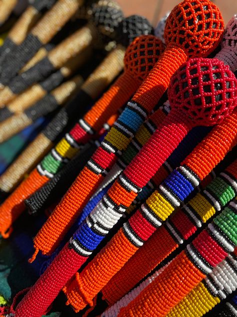 Hand carved beaded stick decorated with Zulu beadwork. Made in KwaZulu-Natal, South Africa. Zulu Head Gear, Zulu Culture Aesthetic, Zulu Traditional Beads, Zulu Aesthetic, Zulu Traditional Attire Umemulo, Zulu Patterns, Umembeso Decor, Masai Beadwork, Zulu Attire