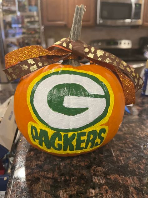 #packers painted pumpkin Pumpkin Painting Ideas Football, Green Bay Packers Pumpkin, Creative Pumpkin Carving, Pumpkin Painting Ideas, Painted Pumpkin, Creative Pumpkins, Football Themes, Thanksgiving Pumpkin, Halloween Party Games