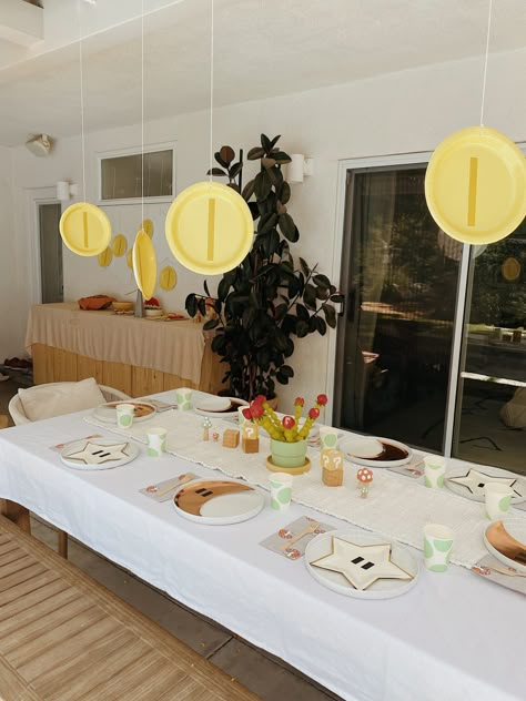 Mario 1 Up Birthday, Super Mario Theme Party Food, Mario Themed Halloween Party, Mario Themed Breakfast, Mario Birthday Party At Park, Retro Mario Birthday Party, Neutral Mario Party, Mario Birthday Party Table Set Up, Mario Birthday Party Aesthetic