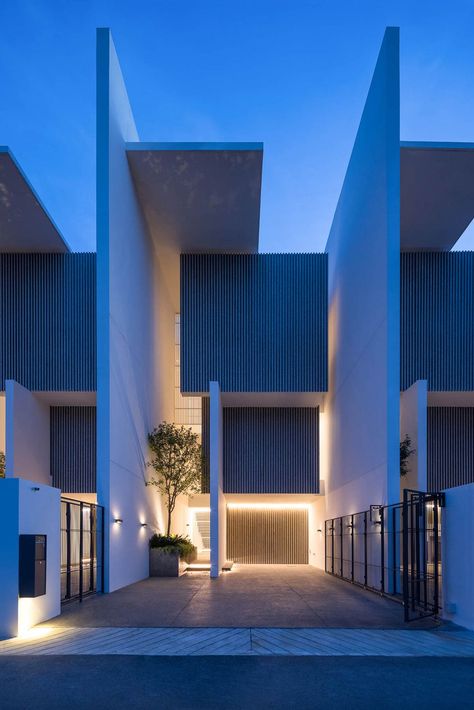 Utilizing a narrow, deep plot, Lom Hai Jai Tranquil maximizes natural light and privacy through a central atrium, double walls for sound insulation and a semi-outdoor stair hall.  📍Bangkok, Thailand Natural Light In Architecture, Light In Architecture, Central Atrium, Cube House, Apartment Studio, Outdoor Stairs, Private House, Sound Insulation, Terrace House