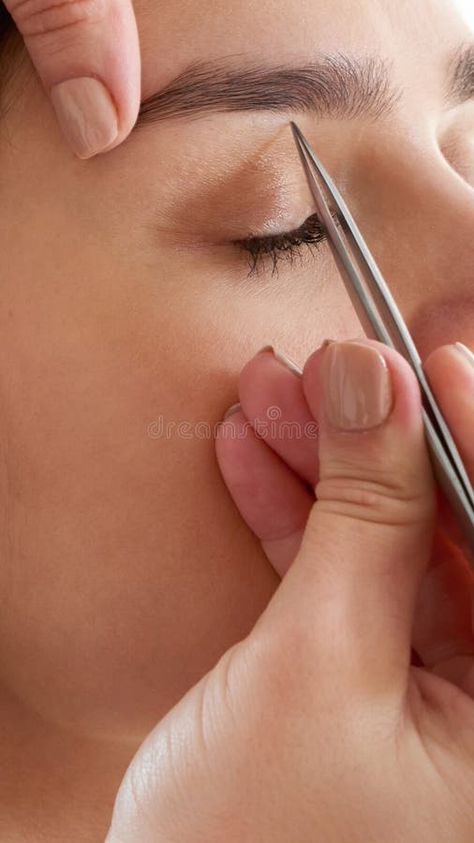 Plucking female eyebrows with tweezers during eyebrow correction in beauty salon stock photos Eyebrow Correction, Female Eyebrows, Vector Typography, Tweezers Eyebrows, Tweezers, Young Woman, Beauty Salon, Eyebrows, Stock Images