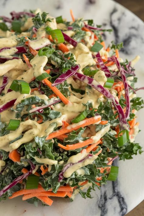 A photo of a  Creamy Kale Coleslaw a Kale Salad Recipes Kale Slaw Dressing, Savory Kale Salad, Kale Coleslaw, Healthy Kale Recipes, Kale Side Dish, Kale Recipes Healthy, Kale Salad Dressing, Best Kale Salad, Crunchy Kale