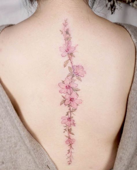 Cherry blossom spine tattoo by @tattooist_flower Back Tattoo Women Spine, Back Tattoos Spine, Floral Back Tattoos, Flower Spine Tattoos, Flower Tattoo Back, Tattoos For Women Flowers, Ornamental Tattoo, Spine Tattoos For Women, Back Tattoos For Guys