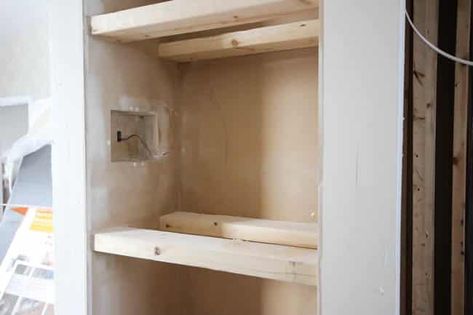 Make your own modern Built-In Shelving with this simple DIY tutorial. Love the natural wood used in this beautiful bathroom renovation! Great tutorial for DIY shelving in the bedroom, living room, or any room! Bathroom Built Ins, Bathroom Linen Closet, Diy Built In, Diy Shelving, Modern Bathroom Renovations, Natural Stain Wood, Diy Bathroom Vanity, Gorgeous Bathroom, Bathroom Remodel Designs