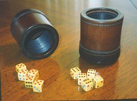 LIAR'S DICE: Requires only dixie cups and five dice per guest (cheap dice can be found most anywhere). You may have seen this game on Pirates of the Caribbean or in the Red Dead Redemption video game. Do a simple Google search to learn all of the rules. This set also makes a great and inexpensive gift! Pirate Dice Game, Caribbean Party, Dice Cup, Dice Games, Diy Games, Drinking Games, Red Dead Redemption, Pirate Party, Game Night