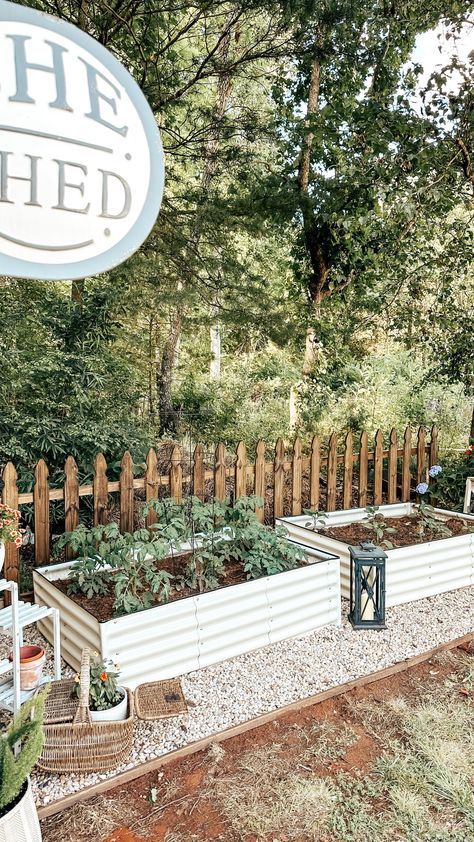 Add a touch of charm to your backyard with our rustic outdoor garden space featuring raised garden beds for veggies and zinnias. Our metal raised garden beds are built to last, and the potting bench and she shed provide the perfect space for tending to your plants. With our easy-to-assemble design, you'll have a beautiful garden in no time.Grow your own fresh veggies and beautiful zinniasSturdy metal raised garden beds built to last Country Porches Farmhouse, Itty Bitty Farmhouse, Affordable Living Room Decor, Southern Living Plants, Building Raised Garden Beds, Metal Raised Garden Beds, Easy Gardening, Farmhouse Outdoor Decor, Rustic Porch