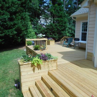 Deck With Benches, Small Wrap Around Deck, Deck With Planter Boxes Built Ins, Planter Boxes Around Deck, Deck Designs Layout, Wood Deck Ideas, Floating Deck Ideas, Backyard Decking, Small Decks