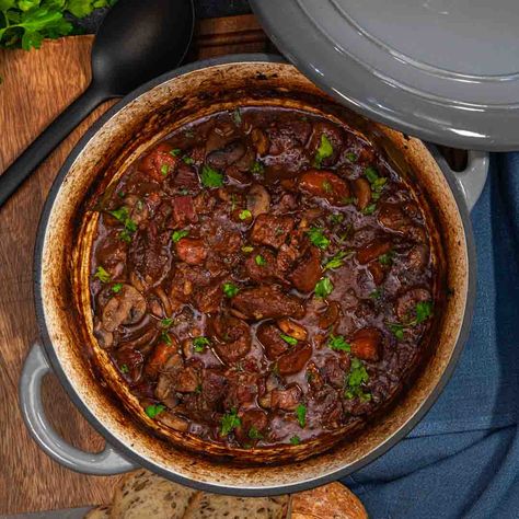 Our Porc Bourguignon will transport you to France in a heartbeat with perfectly tender pork cooked in a rich red wine sauce. Pork Bourguignon, Pork Belly Roast, Parmesan Crackers, Australian Recipes, Bacon Crisps, Sauteed Carrots, Cut Recipe, Red Wine Sauce, Buttered Noodles