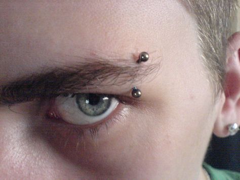 Left Vertical Eyebrow piercing Eyebrow Piercing Men, Piercing Men, Facial Piercing, Upper Lip Piercing, Eyebrow Piercing Jewelry, Men's Piercings, Ear Piercings Tragus, Beautiful Eyebrows, Barbell Piercing