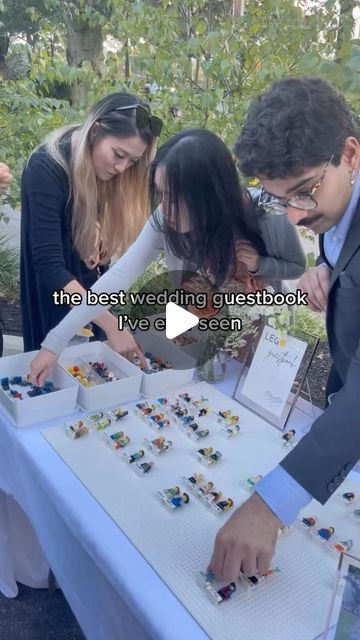 Carats & Cake on Instagram: "Pro-tip: When it comes to truly “WOW-ing” your guests, details matter. This #nontraditional approach to a guest book had RSVPs building their lego-sized look-alike with personalized pieces. #caratsandcake 🎥: @gillianleephotos" Lego Wedding, Lego Books, Lego Gifts, Purple Wedding Theme, Lego Lovers, Lego People, Unique Guest Book, Cute Wedding Ideas, Seating Chart Wedding