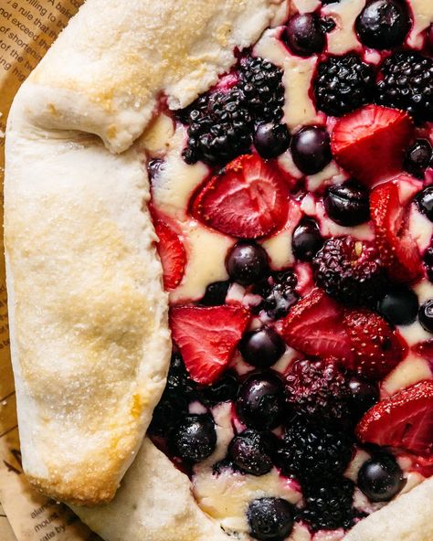 Celebrate the Fourth of July with a burst of flavor in every bite of this Triple Berry Cheesecake Galette! 🇺🇸 Made with @BobsRedMill unbleached white all-purpose organic flour for a perfectly flaky crust, this dessert is a crowd-pleaser for everyone at your festive gathering {Seamlessly substitute their gluten-free one-to-one baking flour for a celiac-friendly option, it has virtually the same taste and texture!}. The golden buttery crust envelopes a creamy cheesecake filling, perfectly bal... Meringue Photography, Cheesecake Galette, Triple Berry Cheesecake, Blueberries And Strawberries, Berry Cheesecake, Cheesecake Filling, Flaky Crust, Pie Tart, Home Bakery