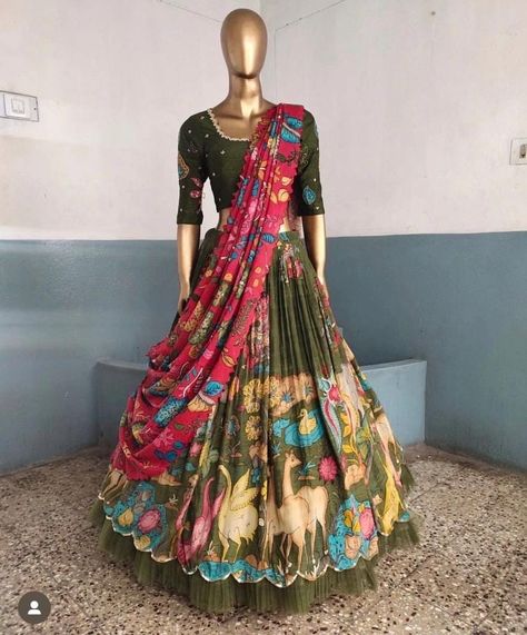 lehenga set  |womens kalamkari lehenga choli |crop top lehenga set |designer kalamkari lehenga dupatta | cream green wedding lehenga choli | mehendi hand painted kalamkari lehenga usa Women's lehenga set /kalamkari embroidered bluelehenga skirt/voggish/ mehendi outfit      lehengas are one of the beautiful and versatile traditional attires of india !! we carry such pieces in budget with great quality that can be styled in multiple ways with different outfits !!       Here is Beautiful lehenga set in mehendi green color and pink color in pure silk hand painted authentic kalamkari set in which skirt has hand painted multi color big border pattern  paired with matching elbow sleeve hand embroidered and hand painted kalamkari blouse as shown!! This set comes with contrast pink hand painted dup Cream Green Wedding, Green Wedding Lehenga, Hand Painted Lehenga, Painted Lehenga, Kalamkari Lehenga, Lehenga Green, Top Lehenga, Usa Wedding, Kalamkari Blouse