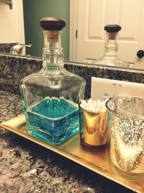 Jack Daniels bottle recycled as a mouthwash holder, much prettier than plastic bottle. Anyone have one i can have?! Jack Daniels Bottle, Bathroom Hacks, Interior Designing, Cool Ideas, Recycled Bottles, Liquor Bottles, Décor Diy, Jack Daniels, Mouthwash