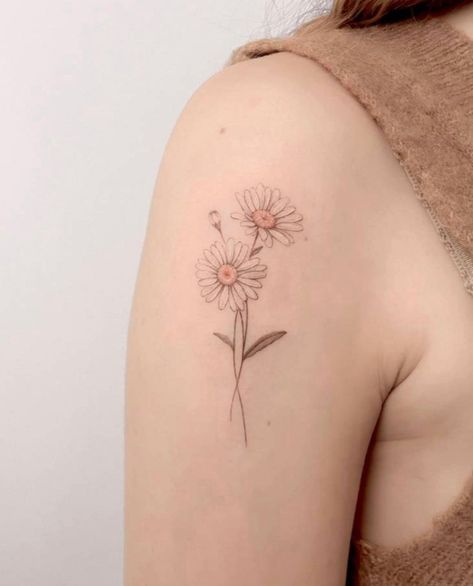 Daisy With Leaves Tattoo, Oxeye Daisy Tattoo, Daisy Cluster Tattoo, Watercolour Daisy Tattoo, Daisy Tattoo With Name In Stem, Poppy Daisy Tattoo, Two Daisies Tattoo, 2 Daisy Tattoo, Daisy Tattoo On Shoulder