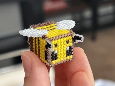 🐝🎨 Buzzing with creativity! Check out this adorable cross-stitch of the Minecraft bee! 🐝✨ Crafting the pixelated charm of the virtual world into real-life art. 🖼️🌼 Who else loves bringing their favorite games to life through crafting? 🎮 Pattern #148608 by RilWil 🌟🧵 Bee from Minecraft was made by @notorgat or bookkpalac on BB. 💛 #MinecraftBee #CrossStitchArt #PixelCrafting #braceletbook #crossstitch #minecraft #bee #spring Minecraft Bee, Orthographic Projection, Unique Cross Stitch, String Bracelet Patterns, Bee Charms, Fuse Beads, Alpha Pattern, Bracelets Handmade Beaded, Alpha Patterns