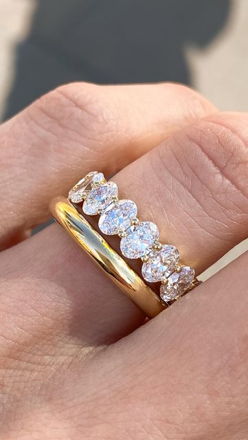 Eternity Band Engagement Ring Stack, Oval Diamond And Wedding Band, Engagement Eternity Band, Gold Band And Diamond Band Stack, Eternity Ring Oval Diamond, Eternity Ring Diamond Oval, Oval Diamond Infinity Band, Yellow Gold Oval Engagement Ring With Diamond Band, Oval Anniversary Band