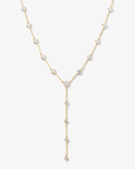 The Lavish Lariat necklace. This necklace features round brilliant cut simulated diamonds and looks perfect with a low cut top or even layered over a t-shirt!  Product Details: 17" with 3" extender 18k Gold Plated Over Brass or Silver Plated Over Brass Stone: White CZ Stone Size: 5mm & 4mm Lobster Clasp SKU: N6056 Diamond Lariat Necklace, Beaded Boho Jewelry, Nepo Baby, Melinda Maria Jewelry, Lariat Necklace Silver, Gold Lariat Necklace, Expensive Jewelry Luxury, Low Cut Top, Cut Top