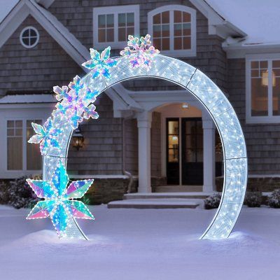 Buy Member's Mark 8' Pre-Lit Arch with Prismatic Snowflakes : Outdoor Cool White at SamsClub.com Christmas Floats For Parades, Snowflake Lights Outdoor, Frozen Outdoor Christmas Decorations, Winter Wonderland Outside Decorations, Outdoor Christmas Backdrop, Blue Outdoor Christmas Decor, Classy Holiday Decor, Outdoor Winter Wonderland Decorations, Christmas Star Decor