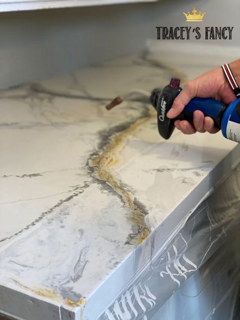 How to pour an epoxy countertop...and more laundry room updates Tracey's Fancy White Epoxy Countertop, Diy Epoxy Countertop, Faux Marble Countertop, Inexpensive Countertops, Laundry Room Update, Paint Stir Sticks, Honed Granite, Silver Spray Paint, Resin Countertops