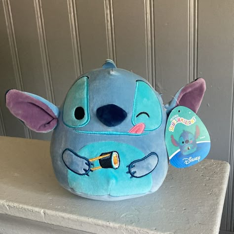 Chillax With New Disney Stitch Squishmallows! This Soft Blue Alien Is Getting Into The Coolest Stuff. Each One Is Super Cute And Ready To Join Your Squad! Styles: Stitch With Fries, Stitch With Scrump, Stitch With Sushi, And, Stitch With Watermelon Size: 6.5in (H) For: Stitch With Sushi Makes A Great Gift For Any Disney Stitch Or Squishmallows Collector Or Fan. Comes Brand New With Tags Is Being Stored Inside A Sealed Bag For Protection So It’s As Fresh And New Once It Arrives To You. Find The O Lilo And Stitch Birthday Gifts, Stitch Squish Mellows, Stitch Stuff Toy, Cute Stitch Stuff, Stitch With Scrump, Stitch Stuffed Animal, Stitch Merchandise, Stitch Things, Lilo And Stitch Movie